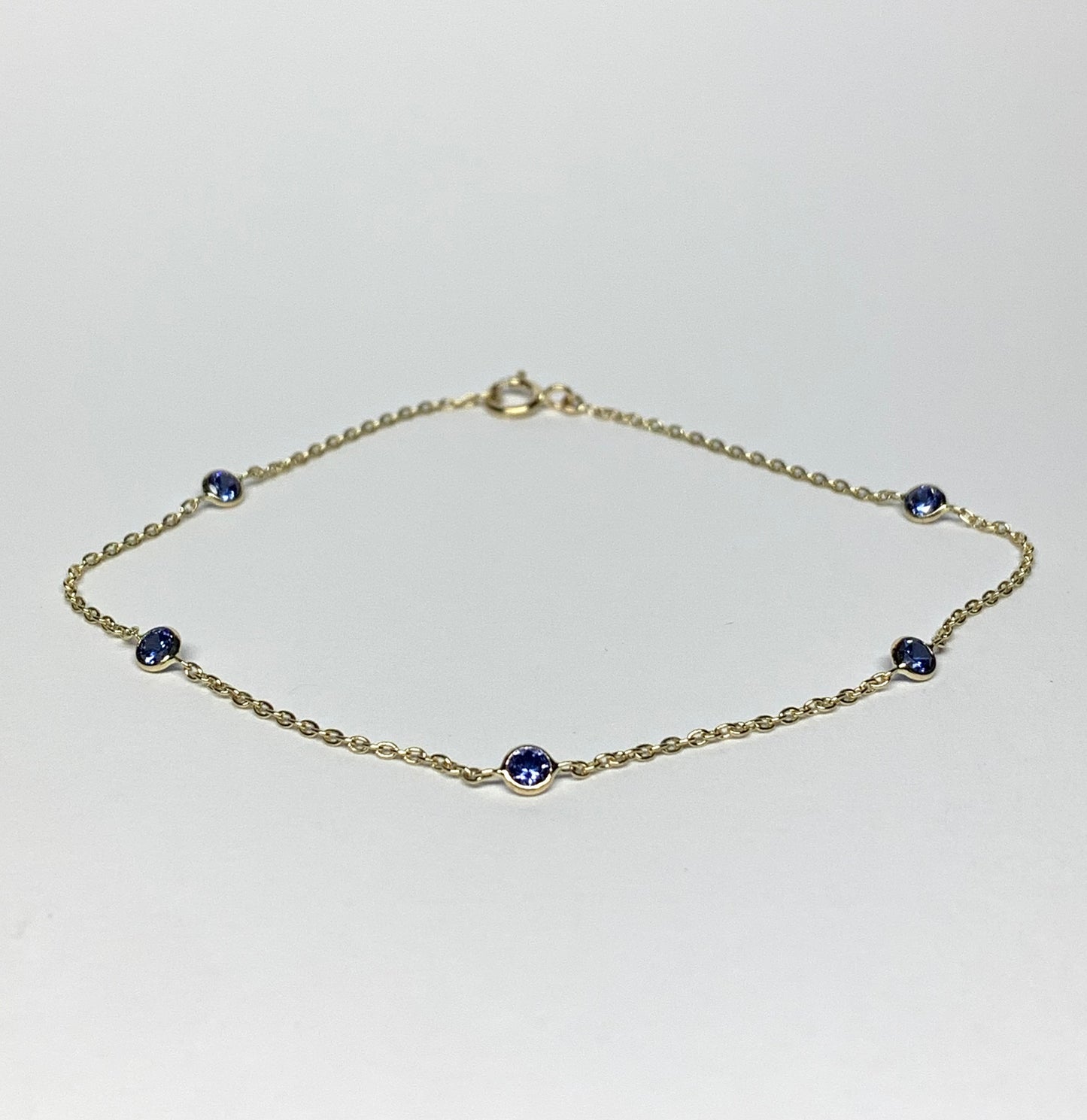 14k Solid Yellow Gold, Blue Cubic Zirconia Station Bracelet